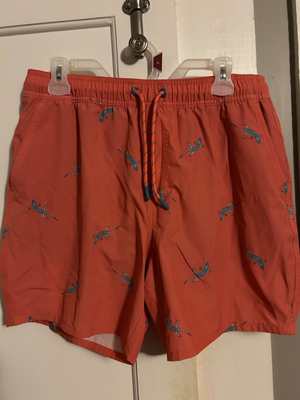 Izod Coral Swim Trunks with Teal Lizard Motif
